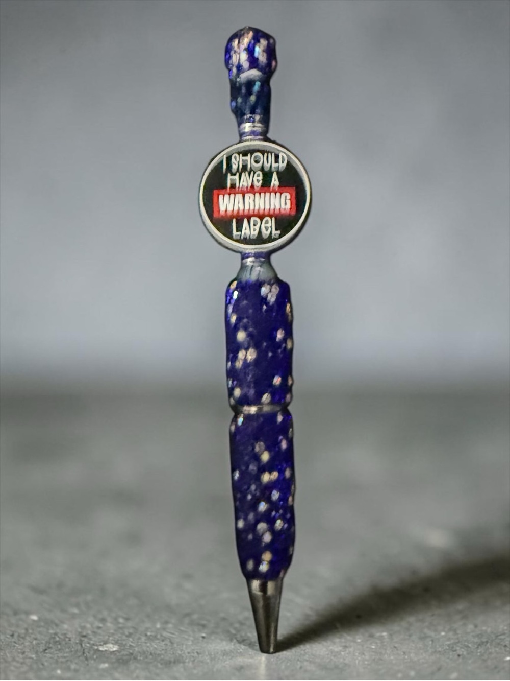 Blue Speckled Decorative Pen with Warning Label Accent